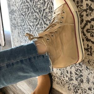 Wedge Converse shoes.
